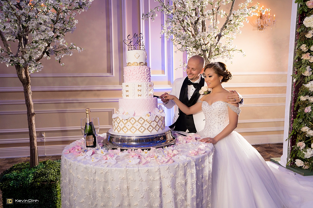 Taglyan Complex wedding reception cutting cake
